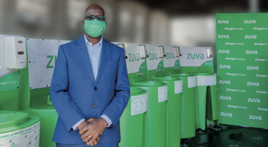 Zuva Petroleum’s Chief Executive Officer Mr Gumbo with the Handwashing basins